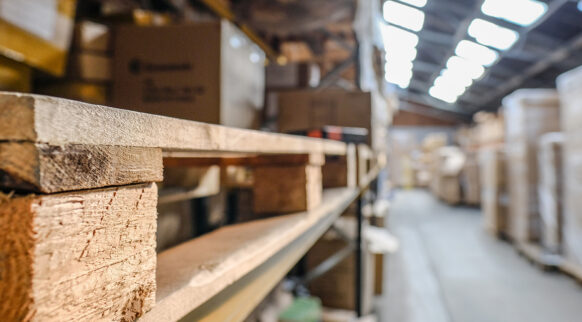 Wooden pallets stacked in a warehouse