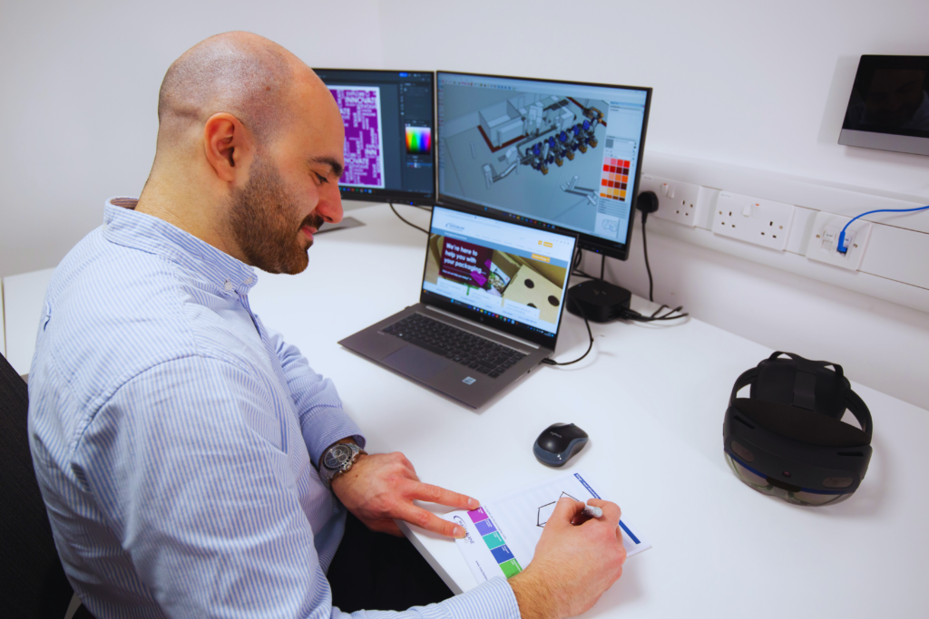 Packaging designer working in the Macfarlane Packaging Innovation Lab